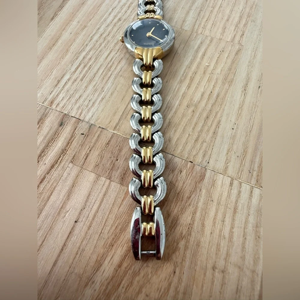 Bulova ladies black dial two toned dress watch NEW BATTERY
